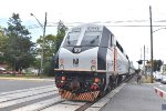 PL42AC # 4024 pushing a westbound out of PPB Station toward Bay Head